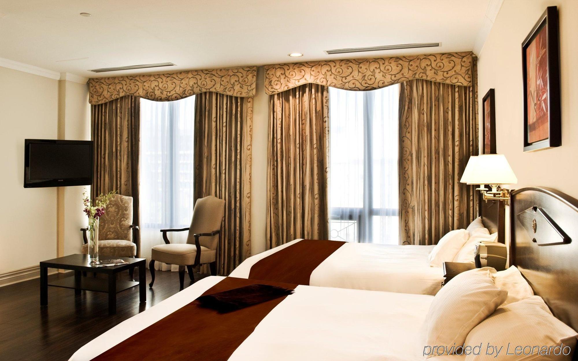 Grand Hotel & Suites Toronto Room photo